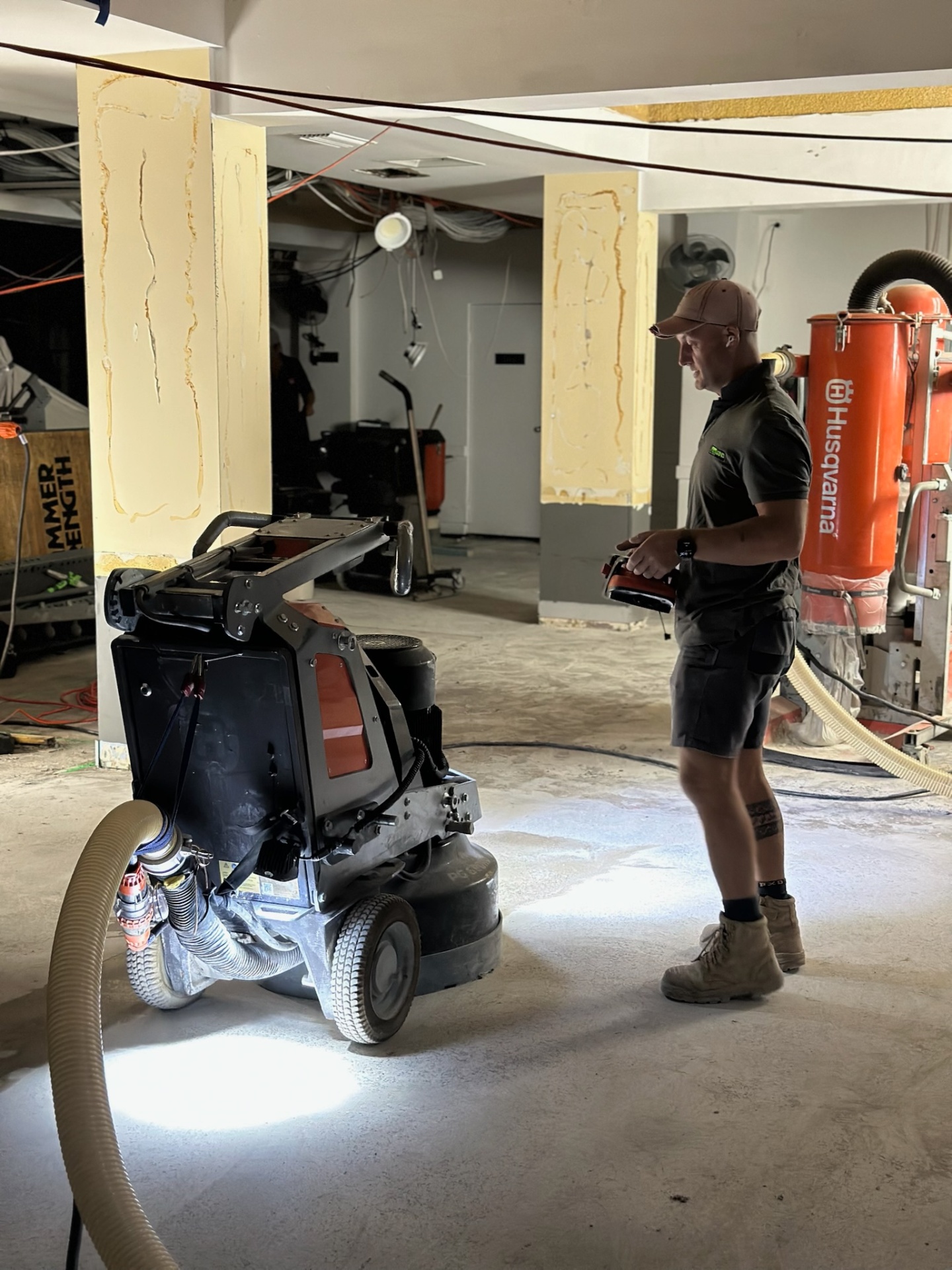 Husqvarna concrete grinder in action on a Sydney project